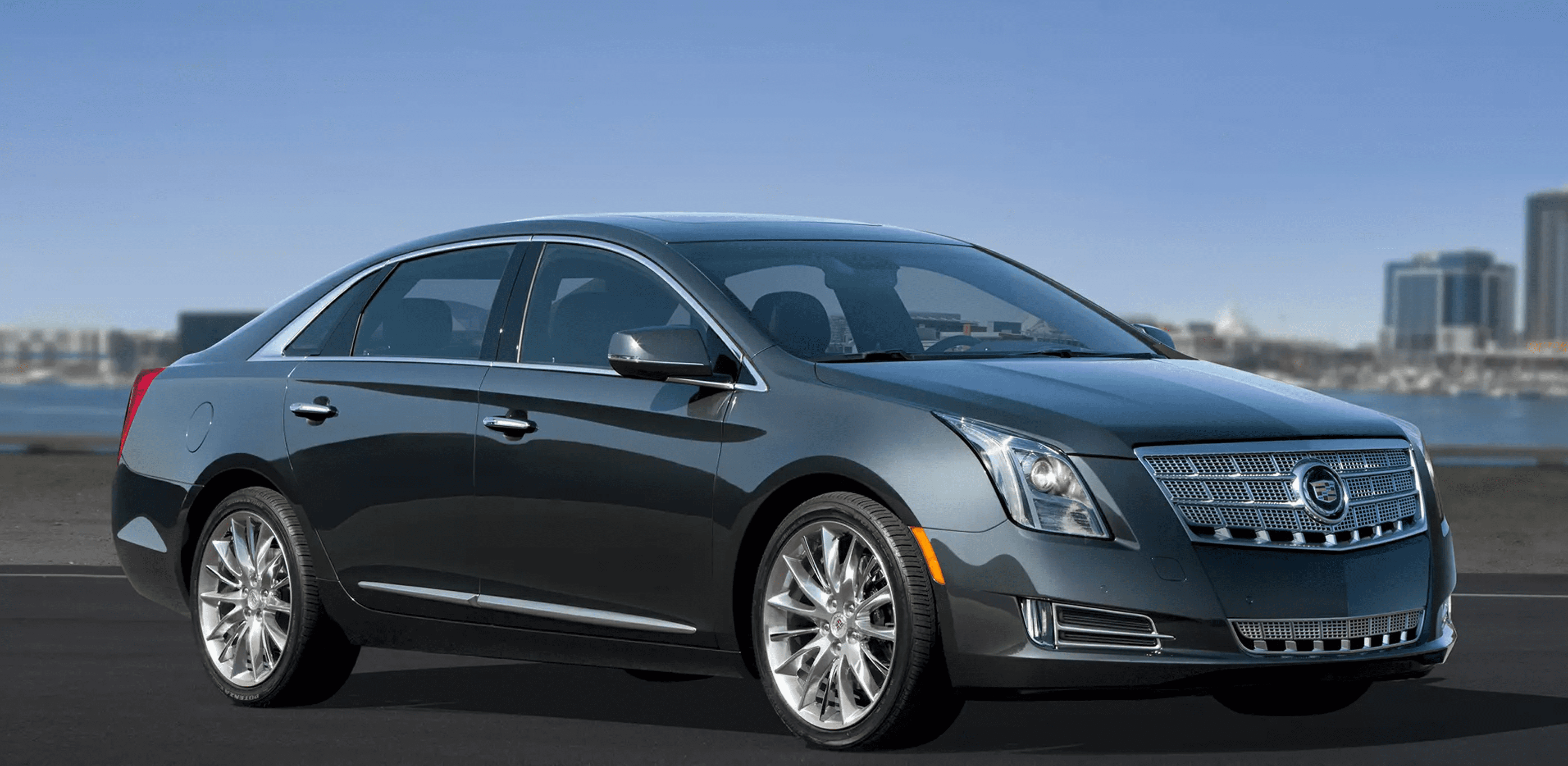 Sleek grey car on city background