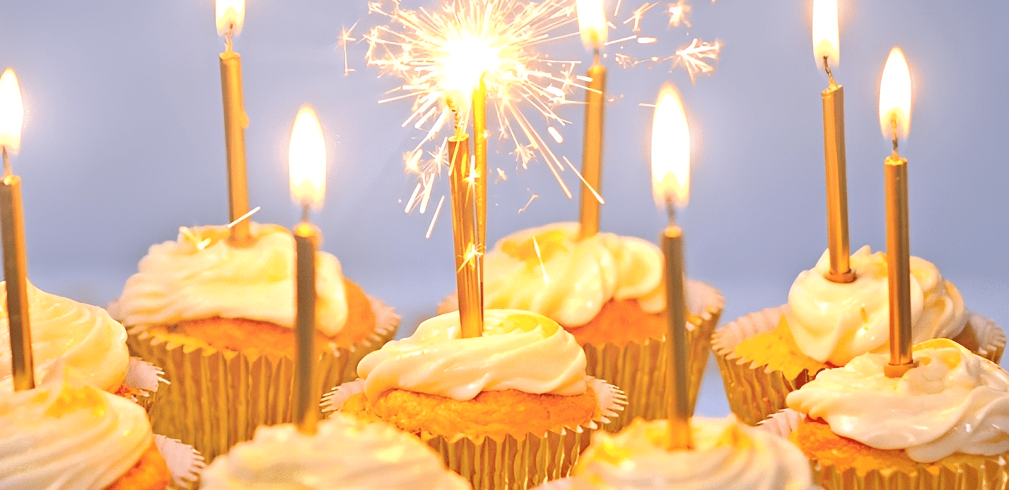 Festive cupcakes with bright candles
