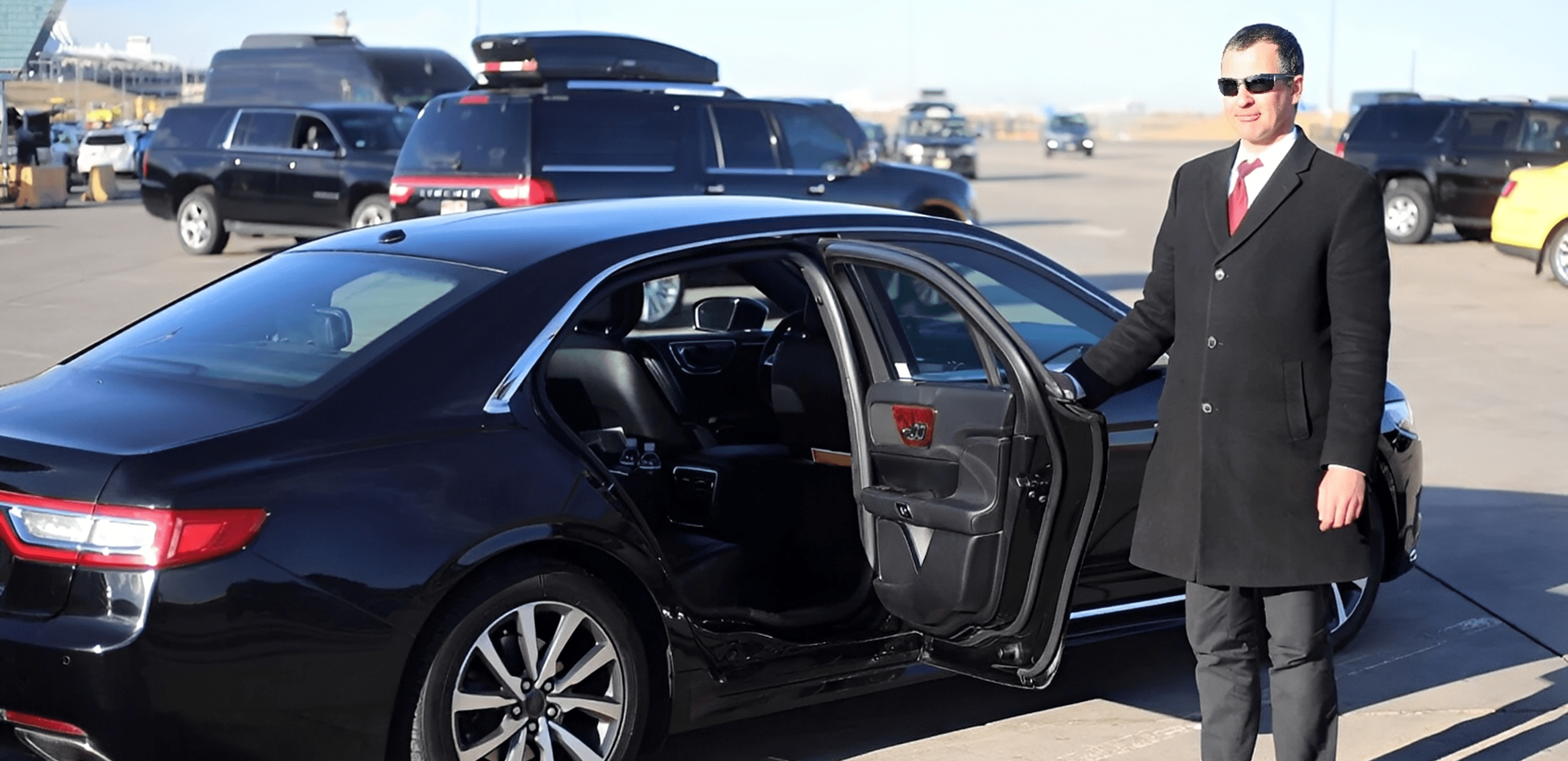 Man holding car door open