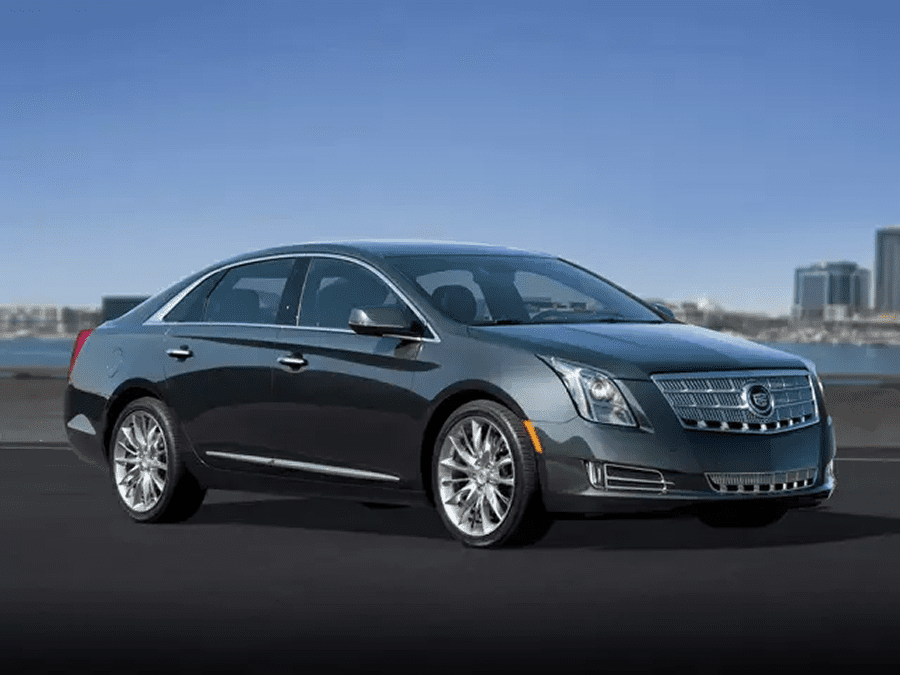 Modern sedan under clear blue sky