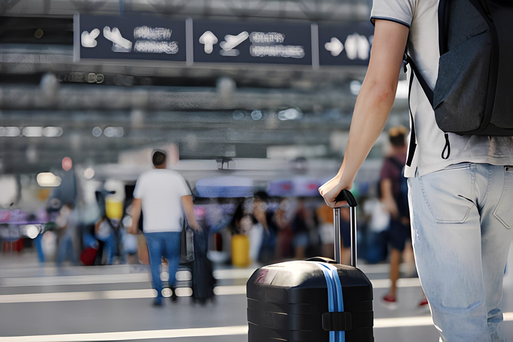 Airport scene with traveler and suitcase