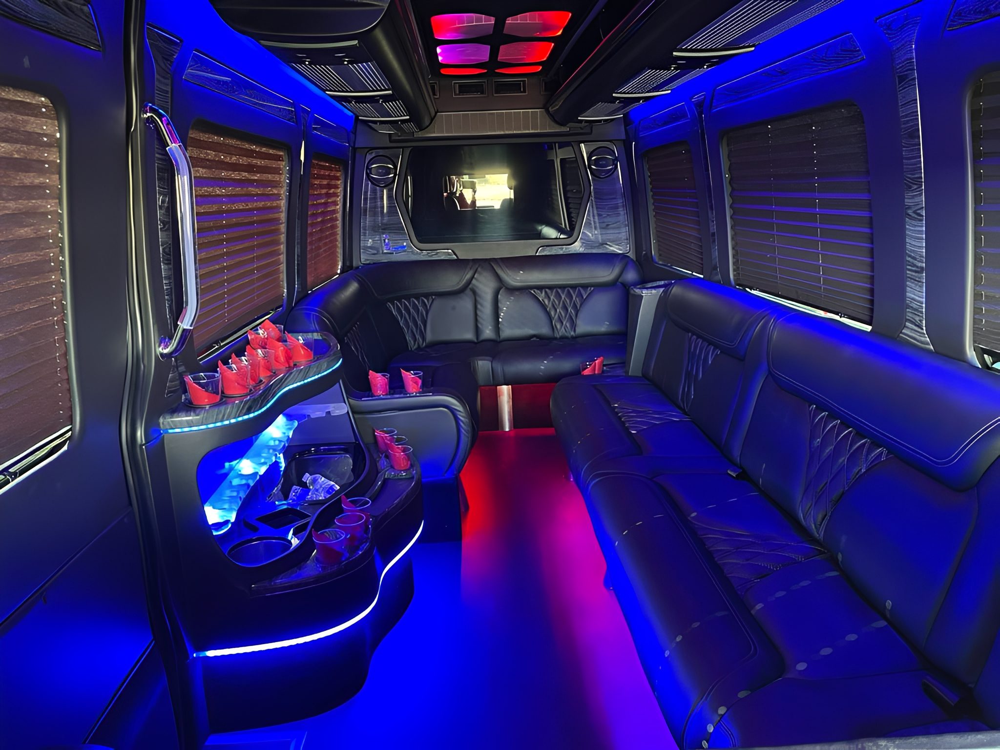 Luxury party bus interior with neon lights