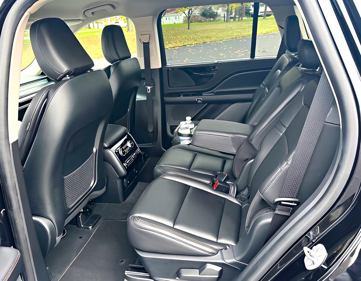 Luxury car interior with black leather seats